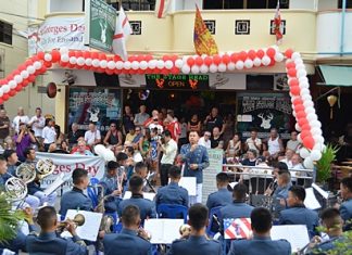 As the band plays on, Englishmen and friends celebrate St. Georges Day at the Stags Head Bar.